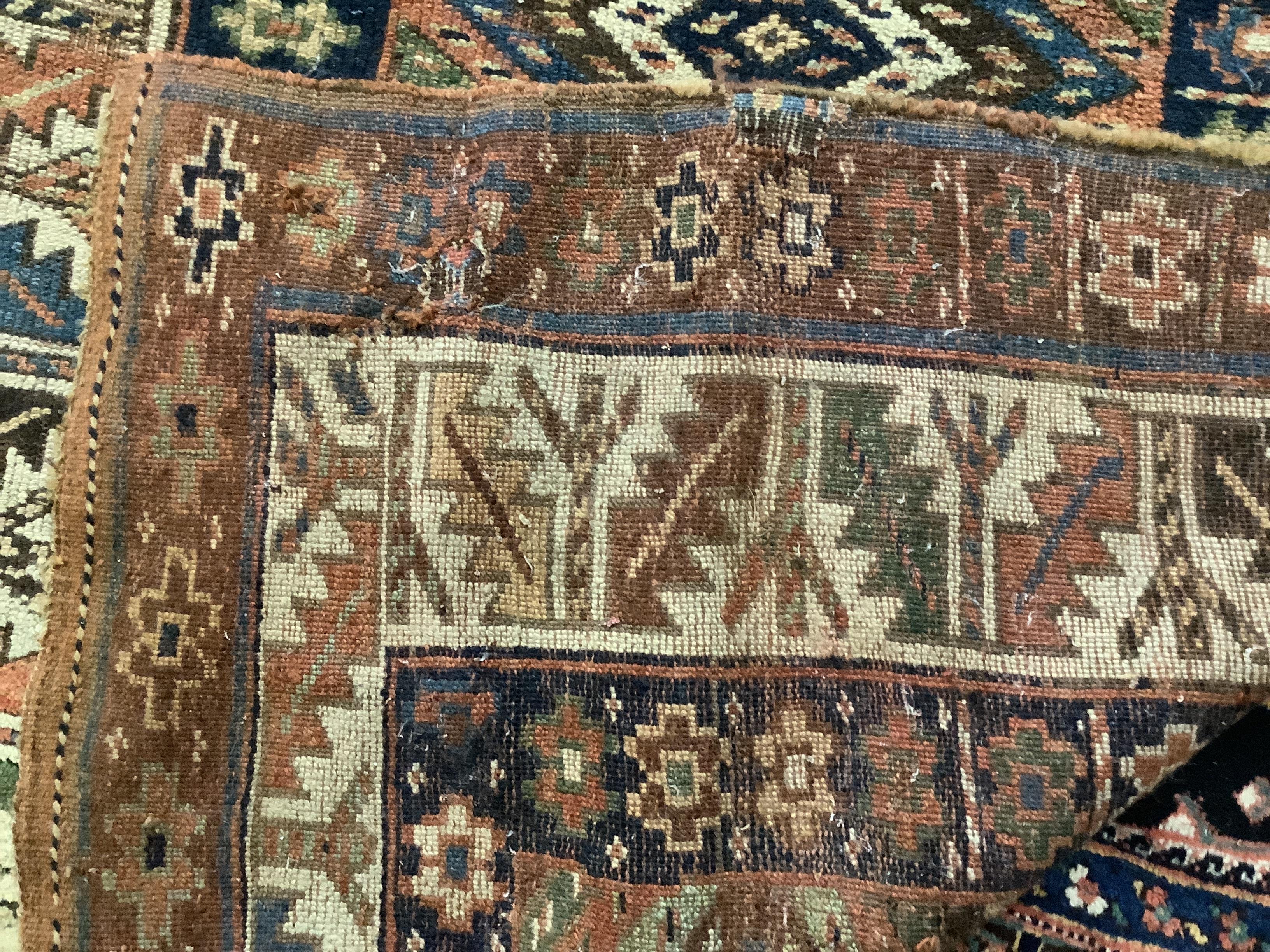 An antique Kurdistan rug, 261 x 119cm